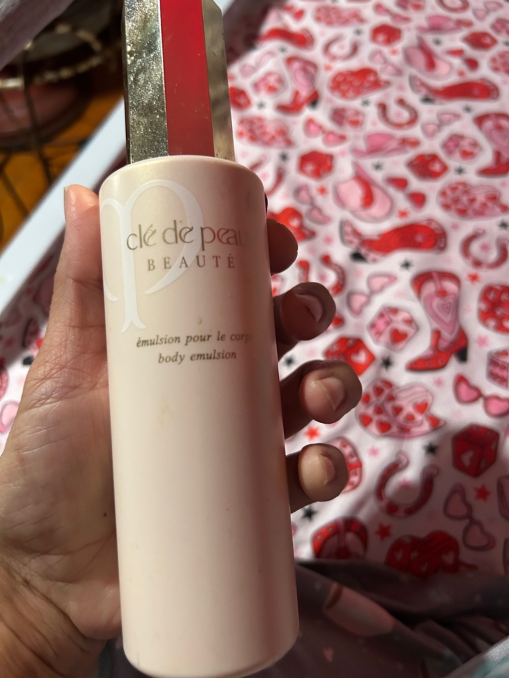 clé de peau Beauté Pink Body Emulsion Bottle